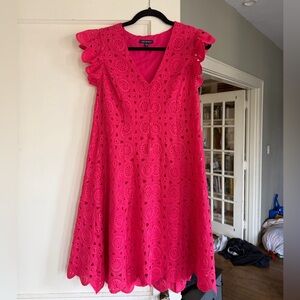 Pink eyelet pattern mini dress with ruffle sleeves 

Size S